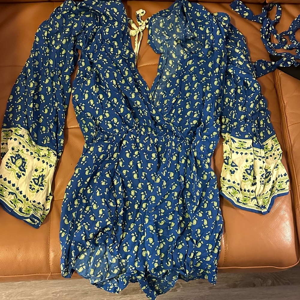 Faithfull the brand Blue Floral Wrap Romper with Contrast Cuffs